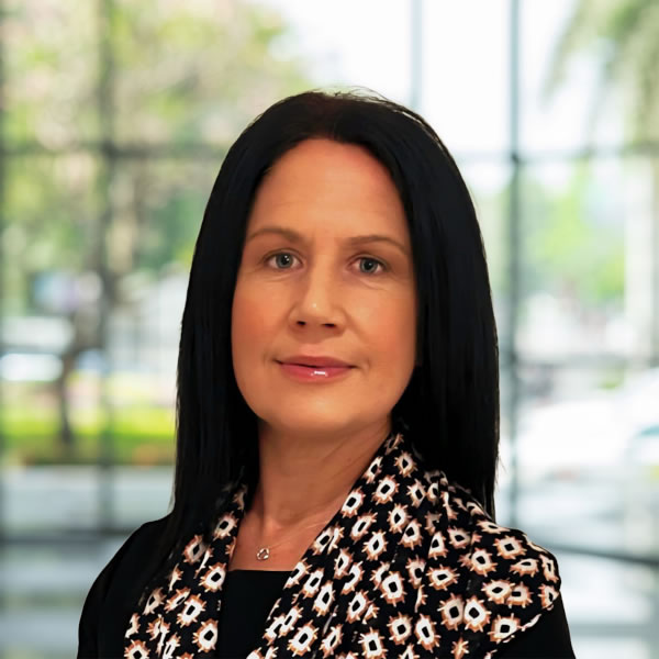 Portrait of a businesswoman in professional attire.